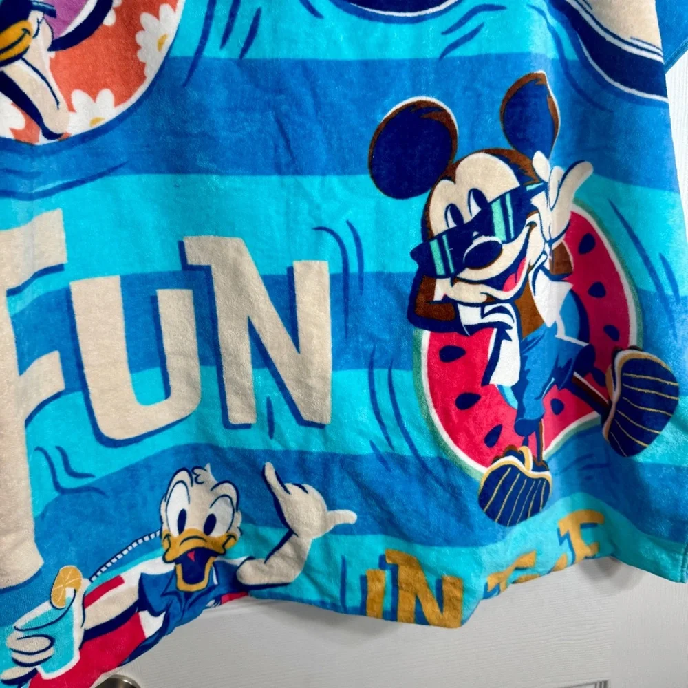 NWT. Disney beach towel featuring Mickey Mouse and others. “FUN IN THE SUN
